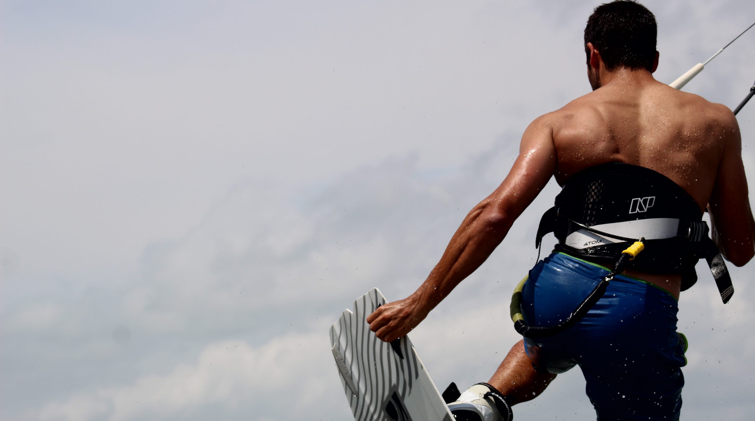 Kitesurfing in Kalpitiya Sri Lanka — kite packs flat water lagoon IKO school